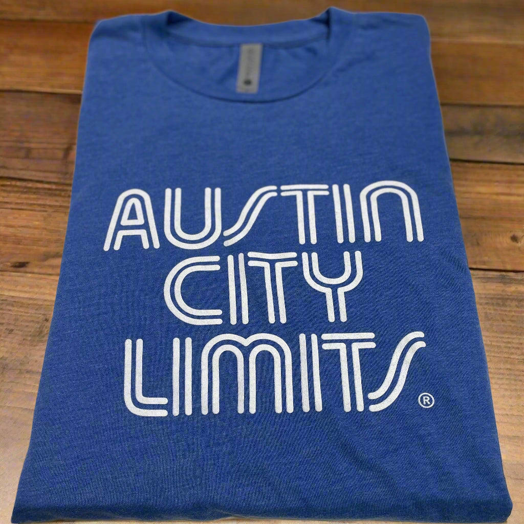 A blue crew neck t-shirt with 'Austin City Limits' text in white