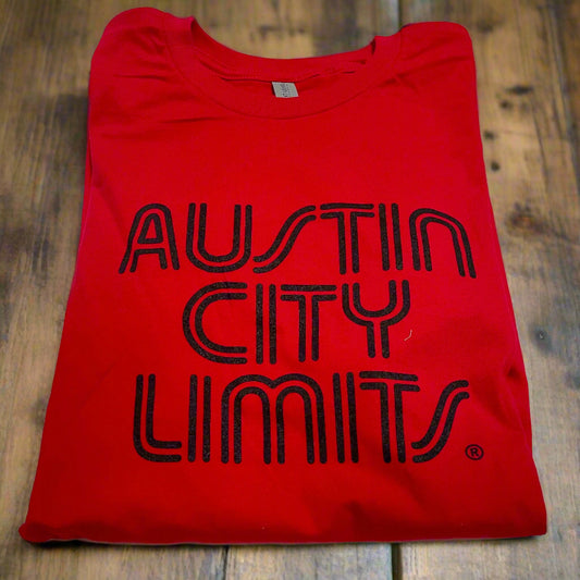 A red crew neck t-shirt with 'Austin City Limits' text in black.