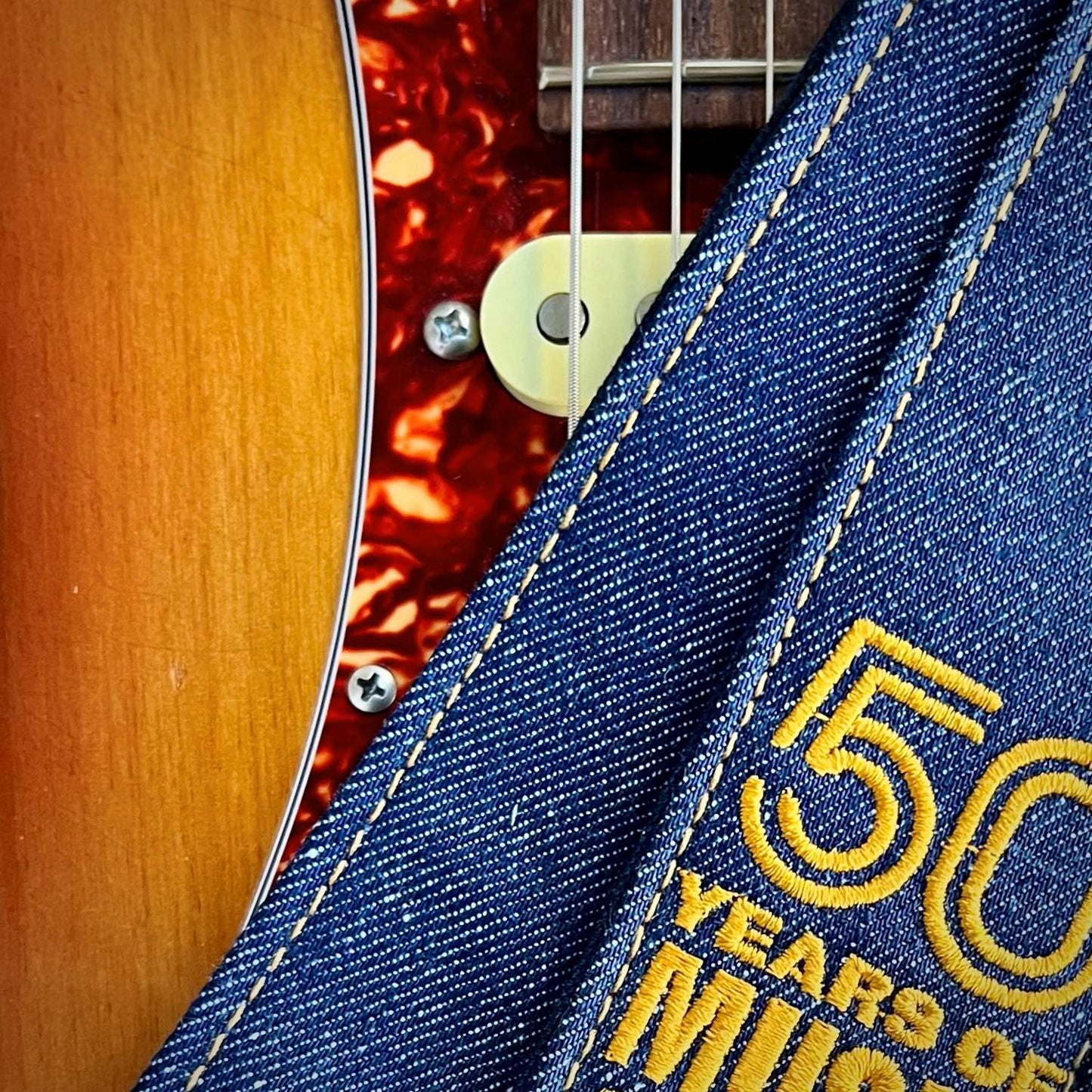 HEROES INDIGO DENIM GUITAR STRAP WITH ACL + 50 YEARS OF MUSIC LOGO