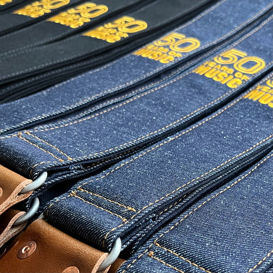 HEROES INDIGO DENIM GUITAR STRAP WITH ACL + 50 YEARS OF MUSIC LOGO