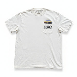 A beige unisex pocket t-shirt with the Austin City Limits 50 years of music logo and skyline printed on the front.