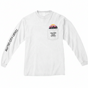 A white long sleeve t-shirt with a pocket on the chest featuring the Austin City Limits logo and a peek-a-boo Austin skyline graphic on the pocket.